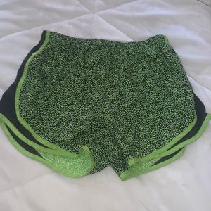 Green and black Nike shorts